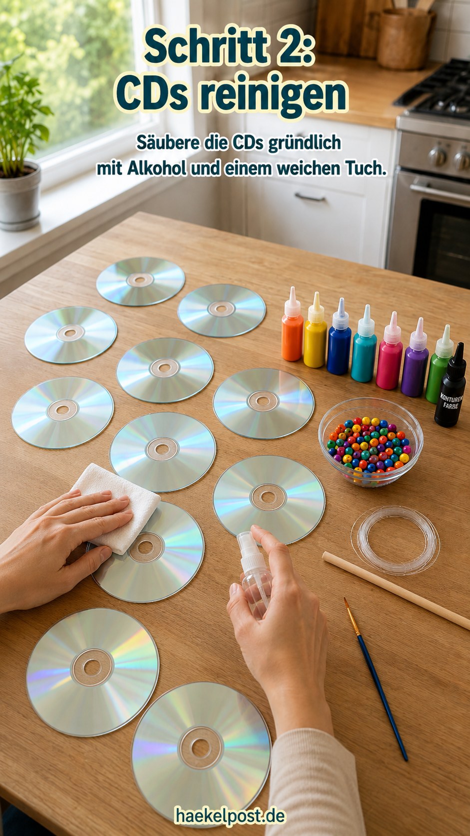 CD wird mit Alkohol und weichem Tuch gereinigt, bevor die Mandala-Blumen aufgemalt werden